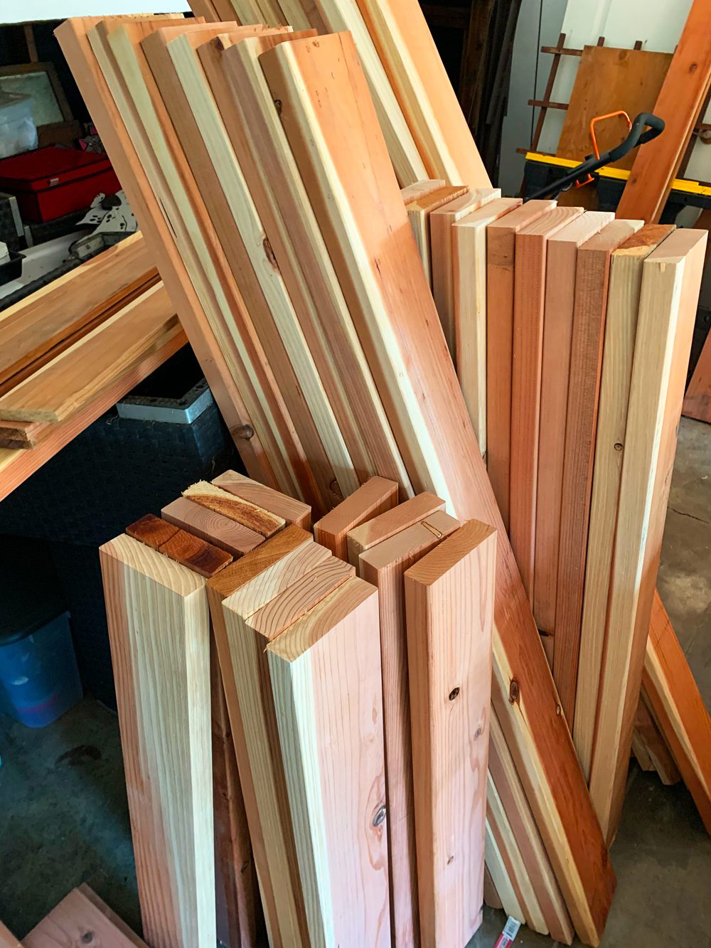 Redwood lumber cut-to-size for custom kitchen garden beds in the Heirloom Potager workshop