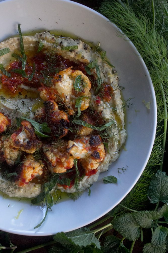 Harissa Cauliflower Hummus with dill, mint, and harissa