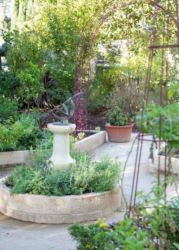 Classic Formal Potager Garden in Southern California | Abundant herb circle centers the potager