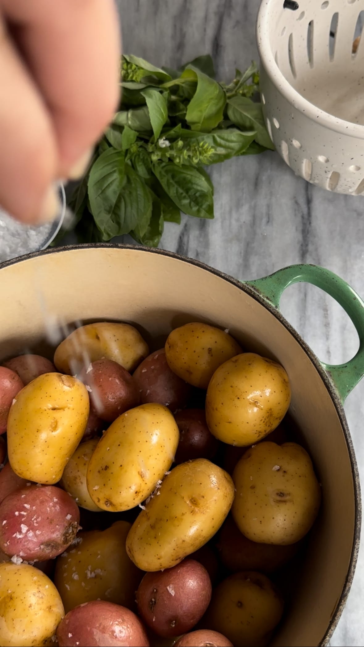 Mix of red and yukon gold potatoes ready to be boiled for Pesto Potato Salad