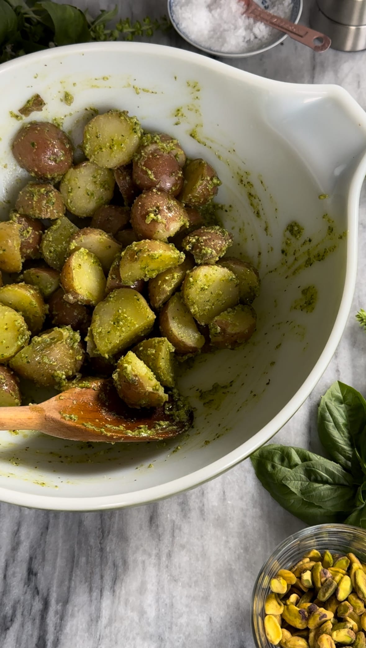 Coated young potatoes in pesto for Pesto Potato Salad