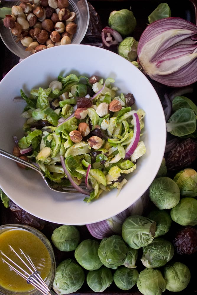 Brussels Sprout Salad with Bacon + Dates + Hazelnuts