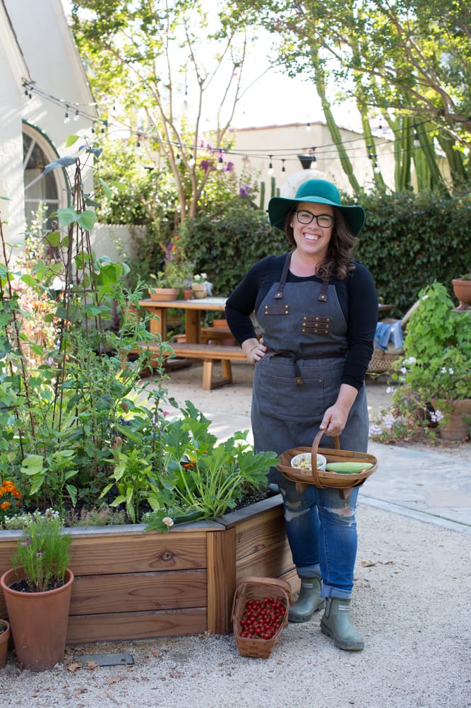 HP_AshleyIrene_ShowcaseGarden_web Ashley Irene, founder of Heirloom Potager standing in the Showcase Garden in Floral Park Santa Ana, CA | Photo by Nicole Kent. All rights reserved.